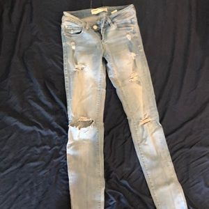 Light washed distressed skinny jeans
